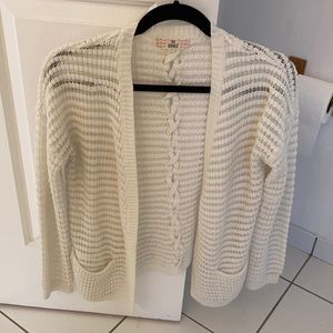 White cardigan sweater